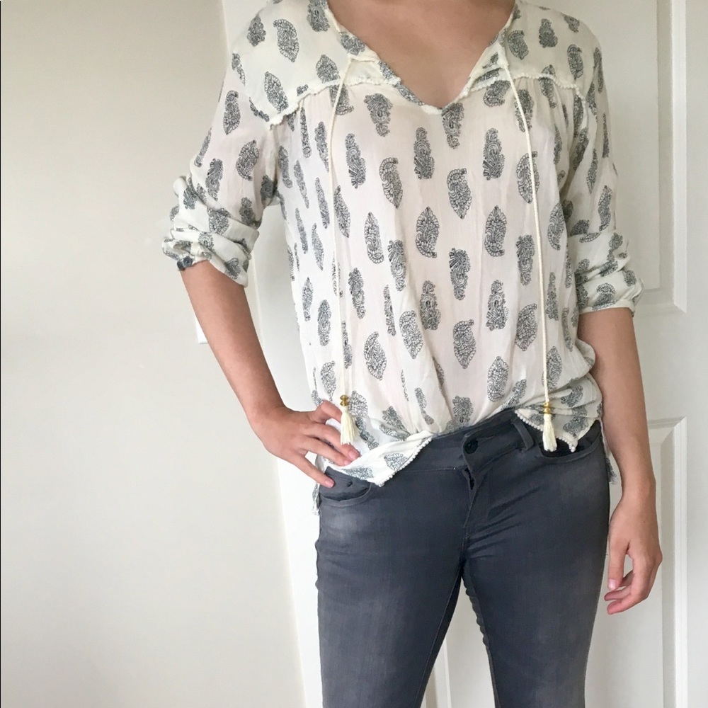 Summer blouse is size M/L